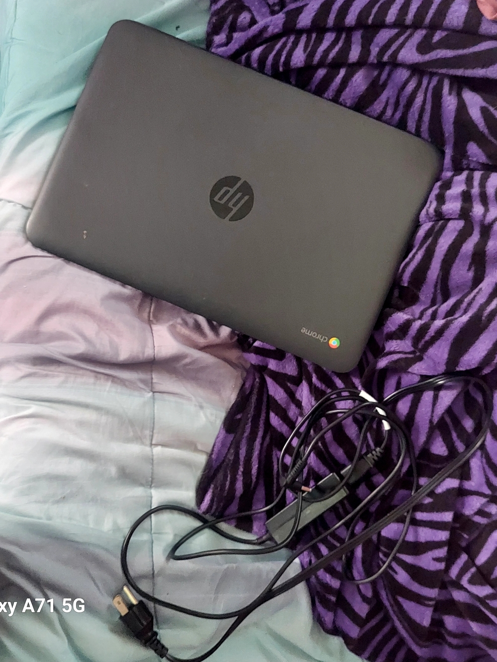 HP Chromebook Laptop in Black with Chrome Accent